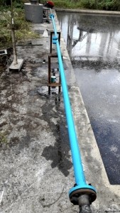 A 60mm PVC pipe that connects to the pipes that pump water out of the wastewater pond
